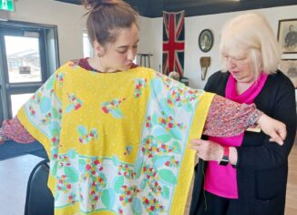 photo of sewing fixer with customer